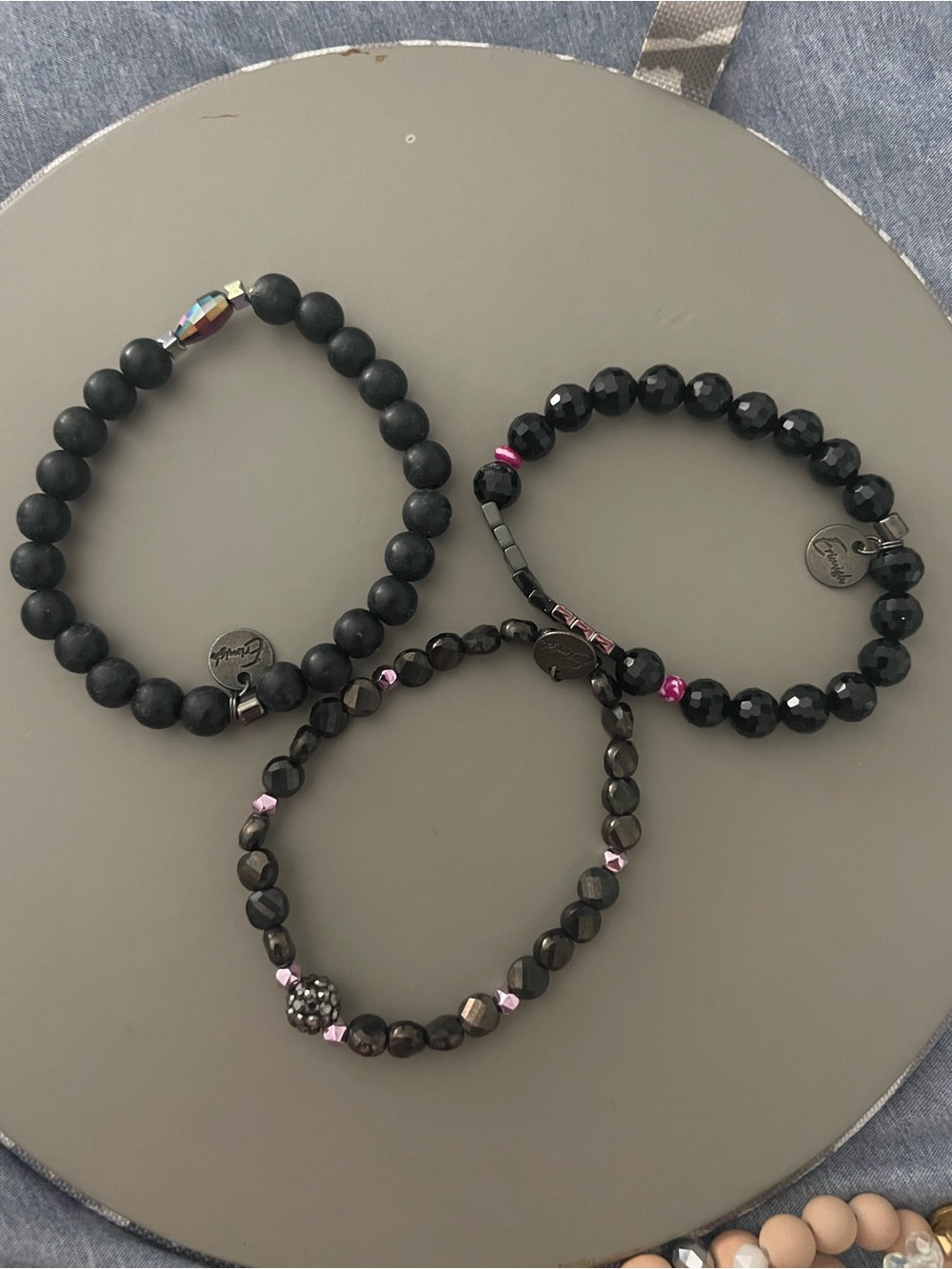 Three-Piece Black Beaded Stretch Bracelet Set with Pink Accents